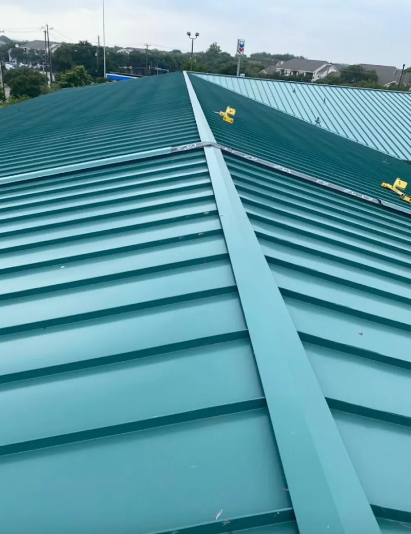 Green commercial metal roof ridge and valley for Metal Roof Repair in Belen