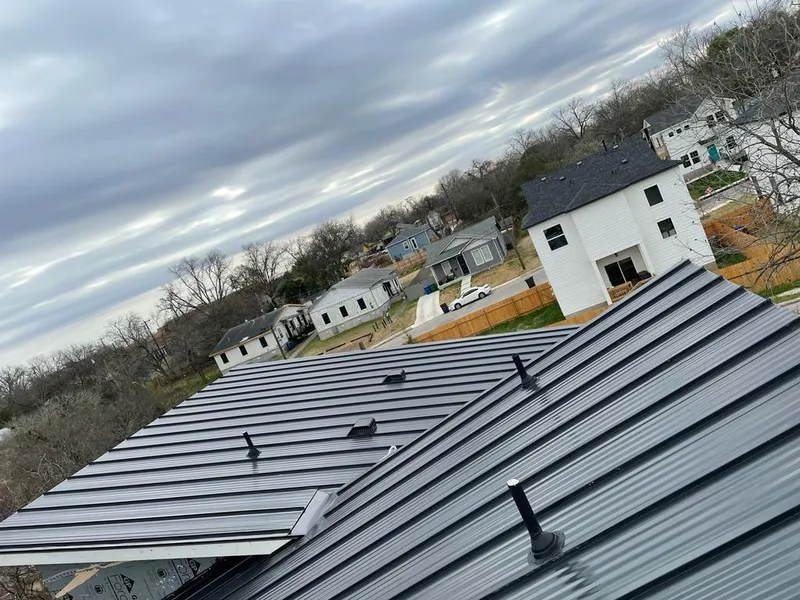 Standing seam metal roof panels with vents for Skylight Repair in Belen